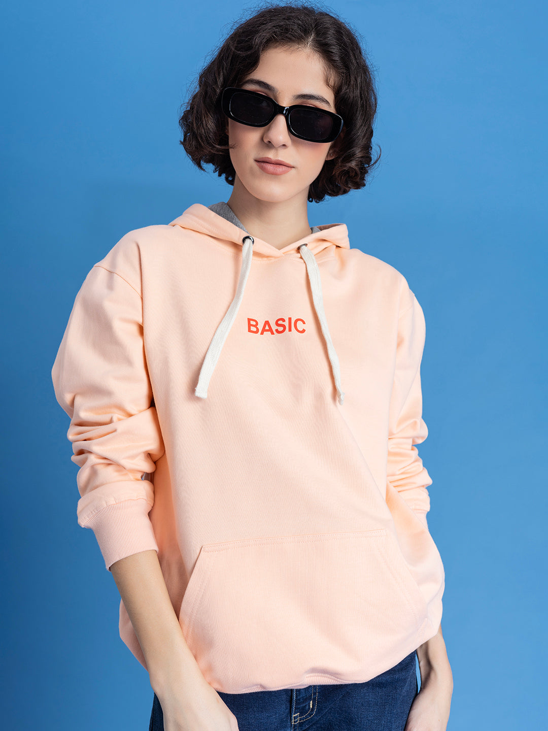 Front view of peach cotton fleece hoodie for women