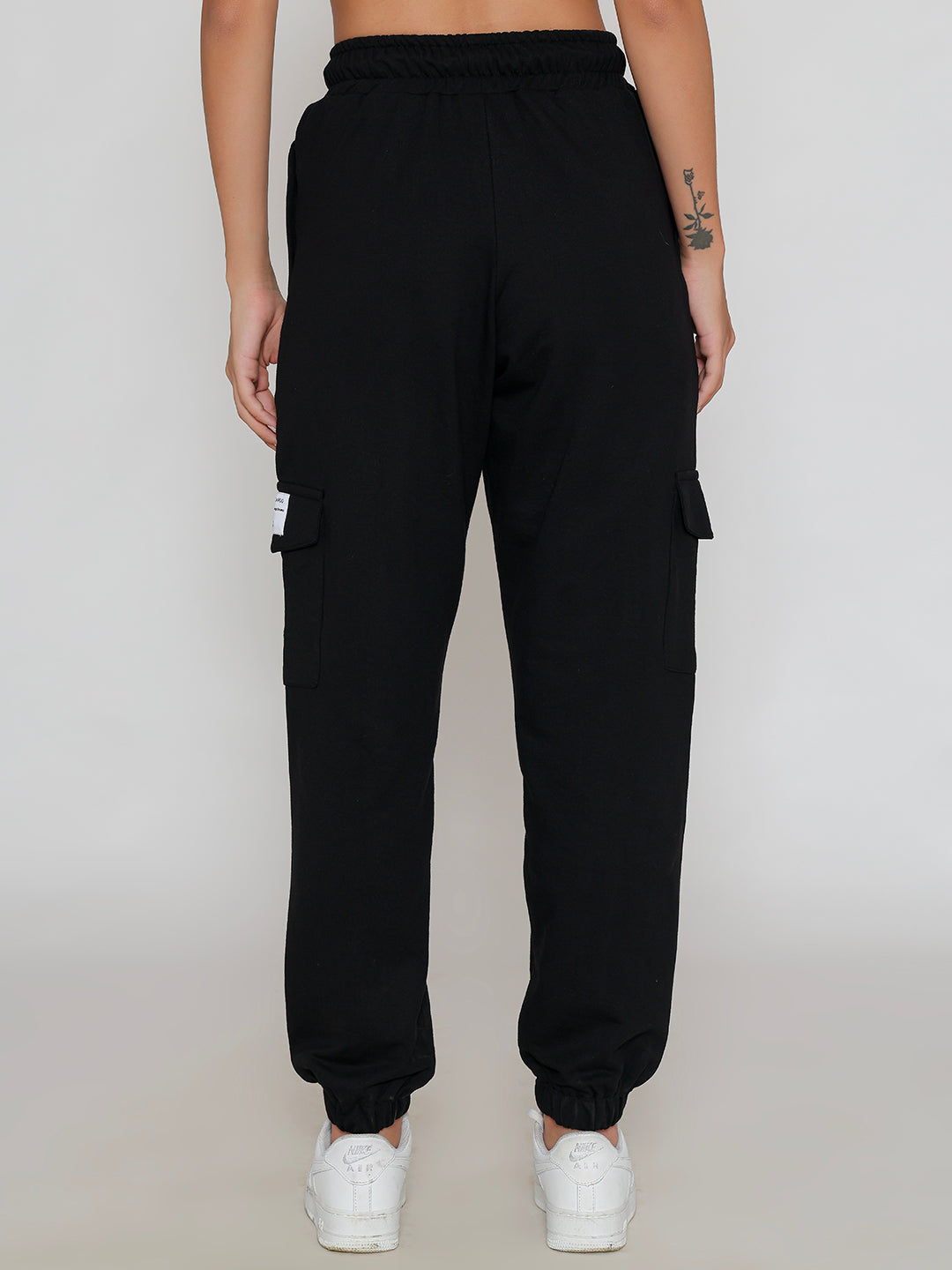 Close-up of elastic waistband on black cargo pants
