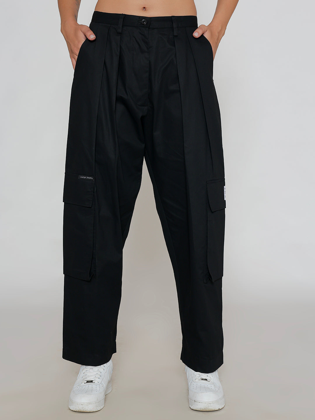 Front view of black cotton cargo pants with multi-pockets