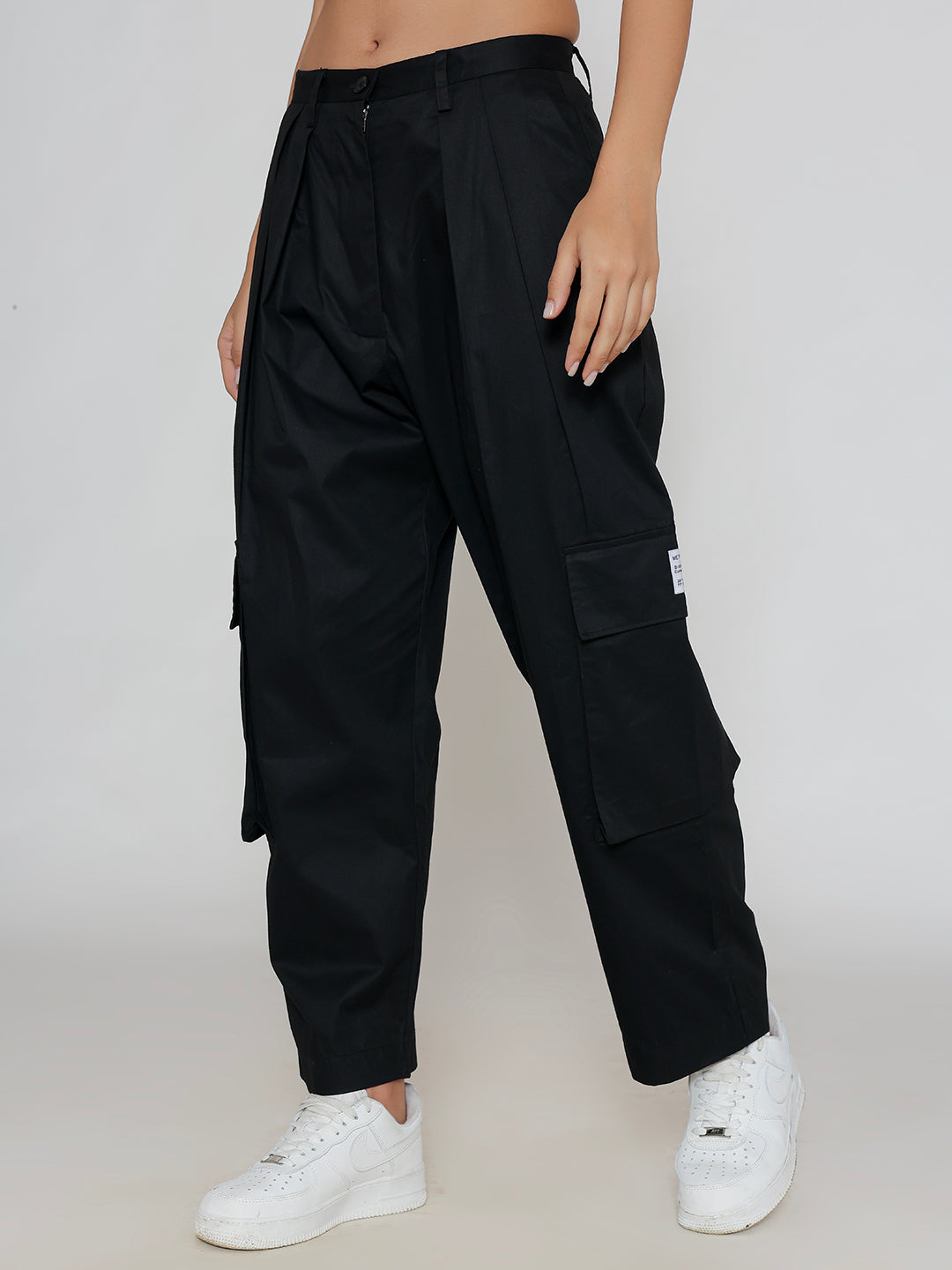 Back view of black cotton cargo pants