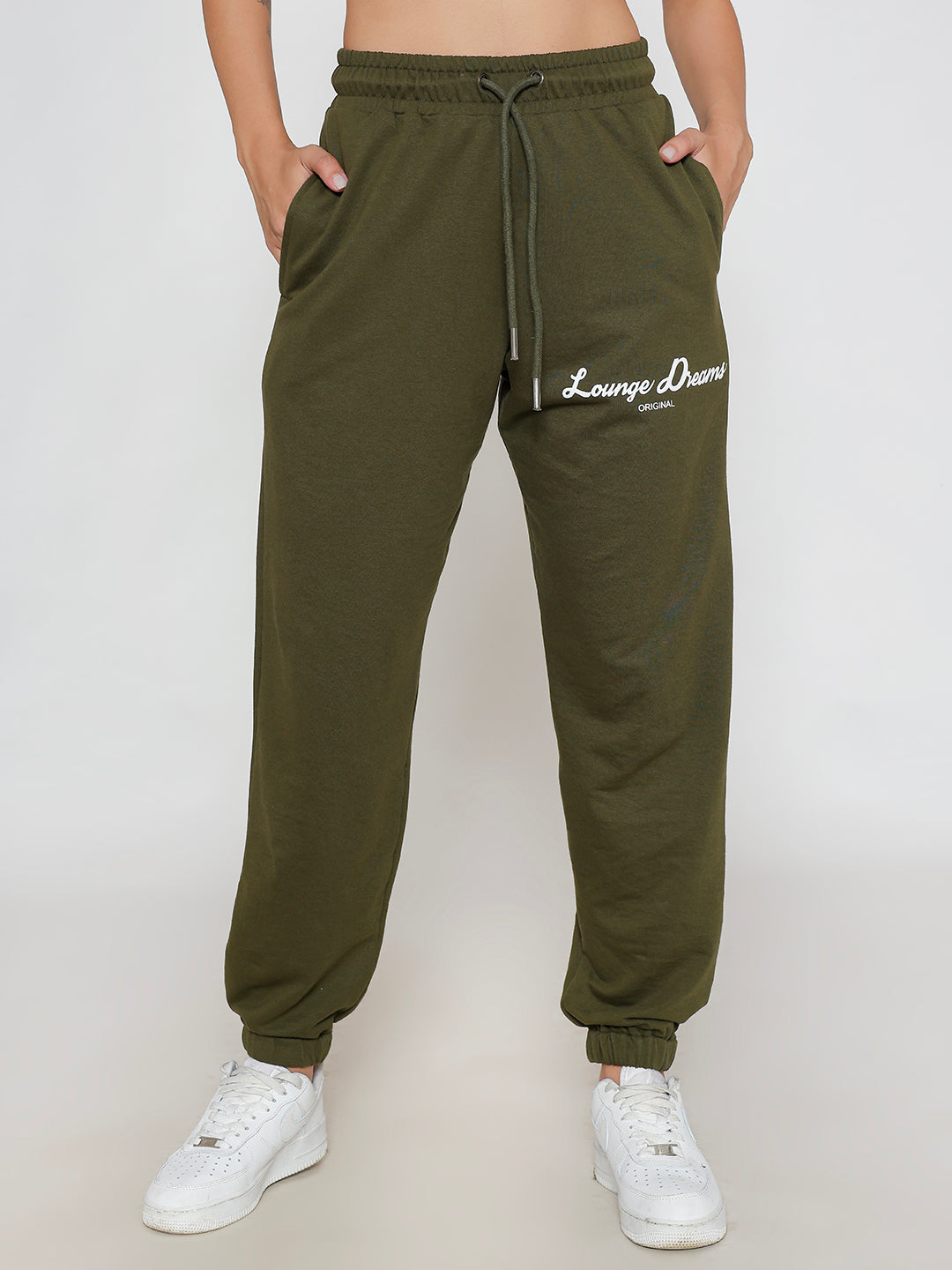 Front view of olive cotton knit joggers with tapered leg