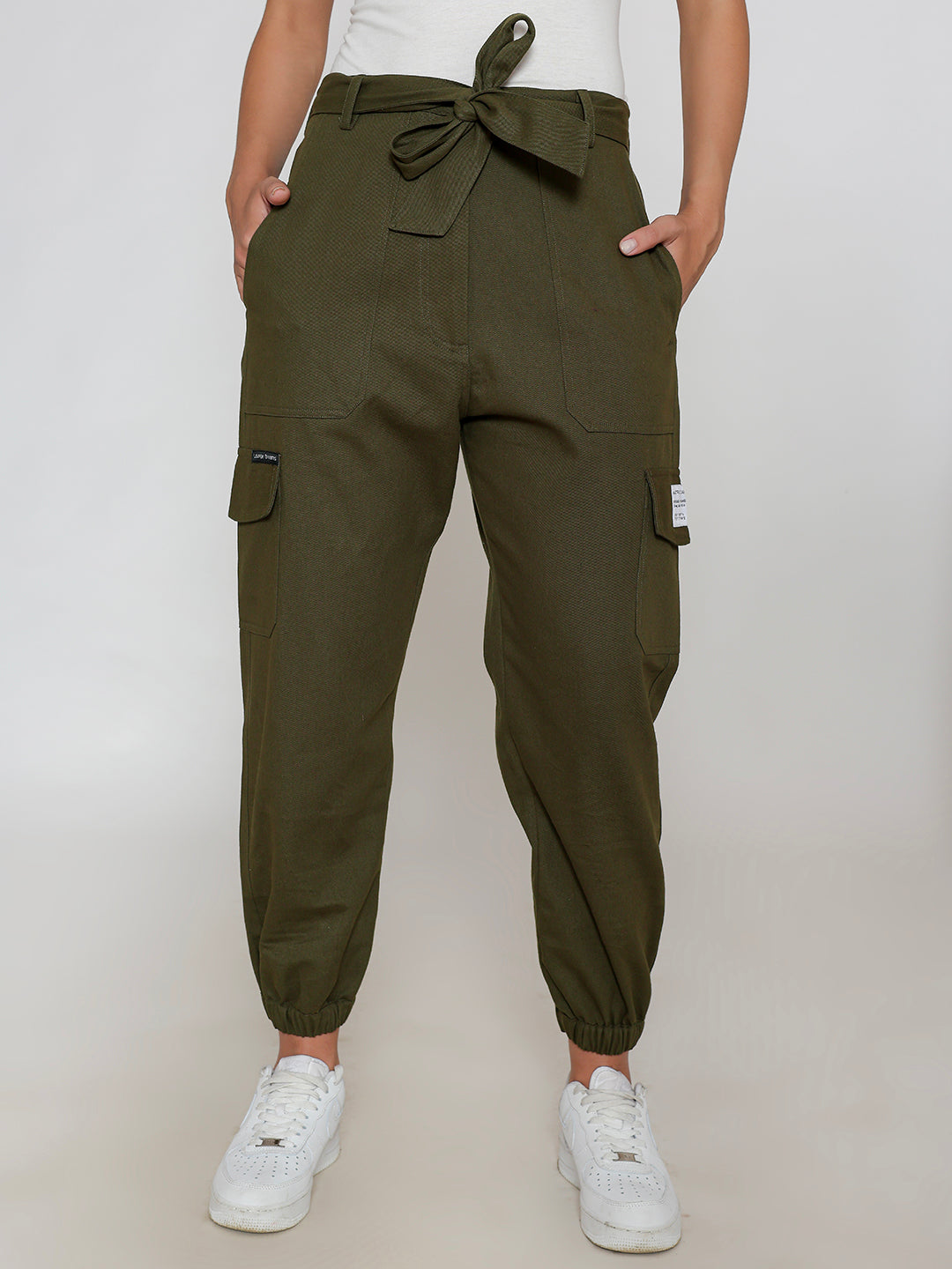 Front view of olive cotton cargo pants with multi-pockets
