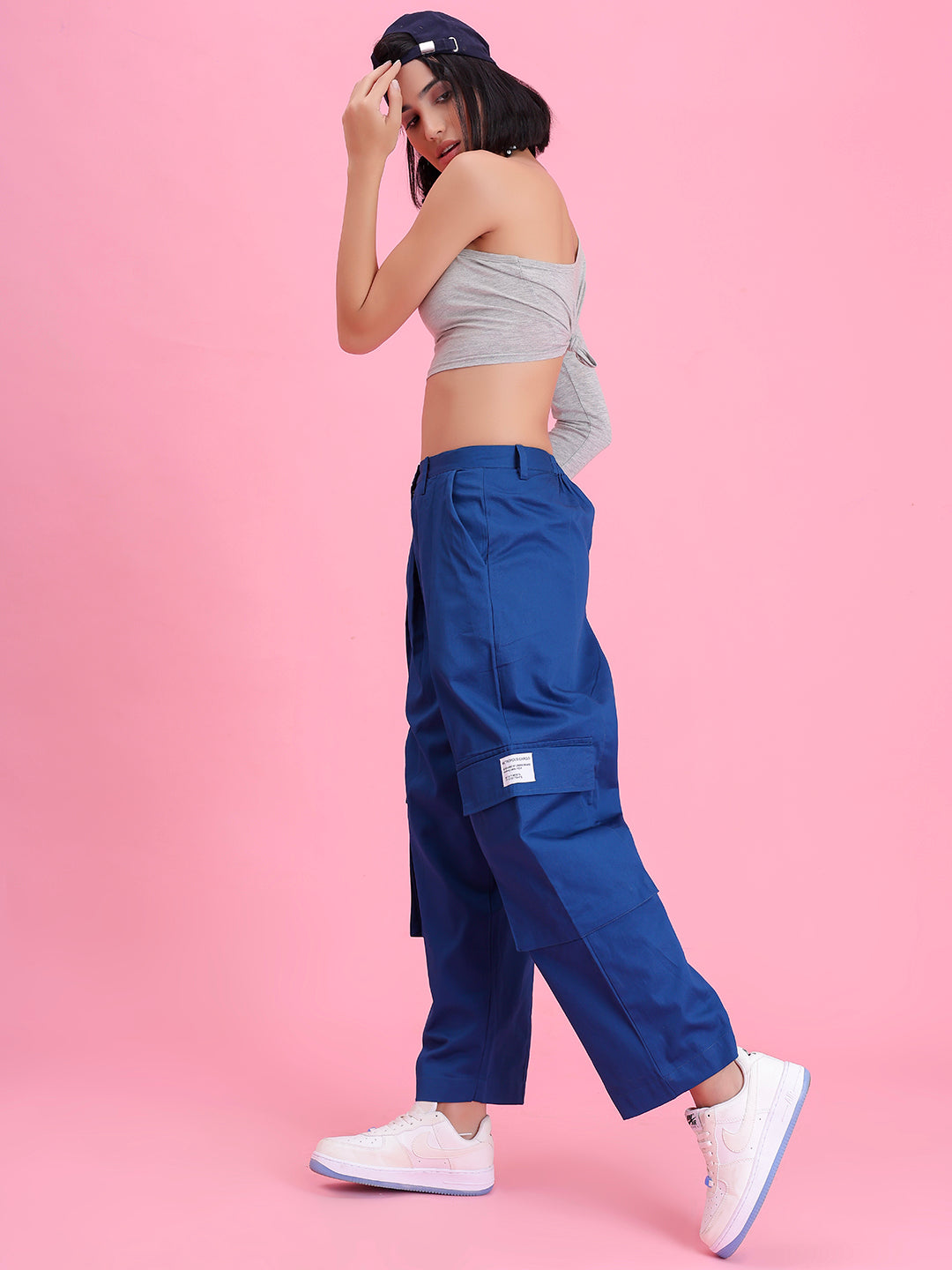 Detail of cargo pocket on navy cotton pants