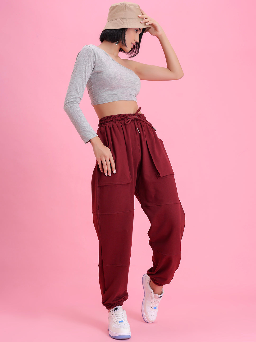 Detail of cuffed hem on wine cotton joggers
