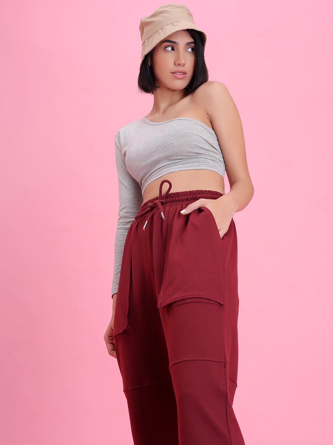 Model wearing wine cotton joggers in a casual look