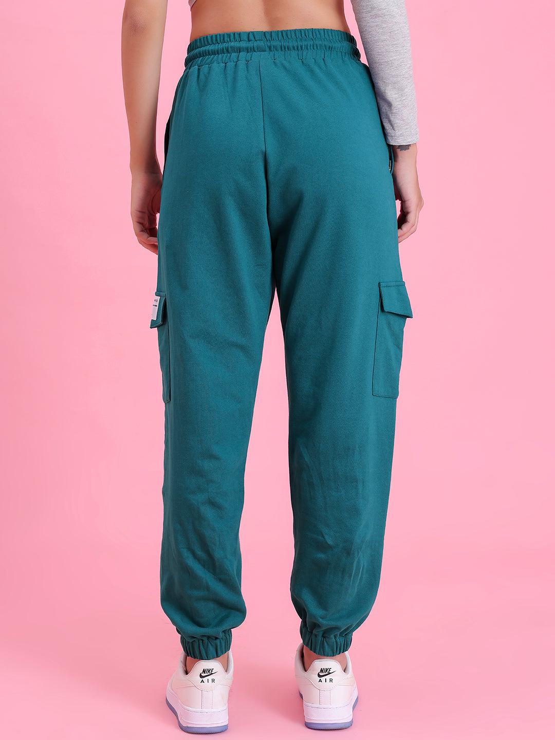 Back view of teal cotton cargo pants