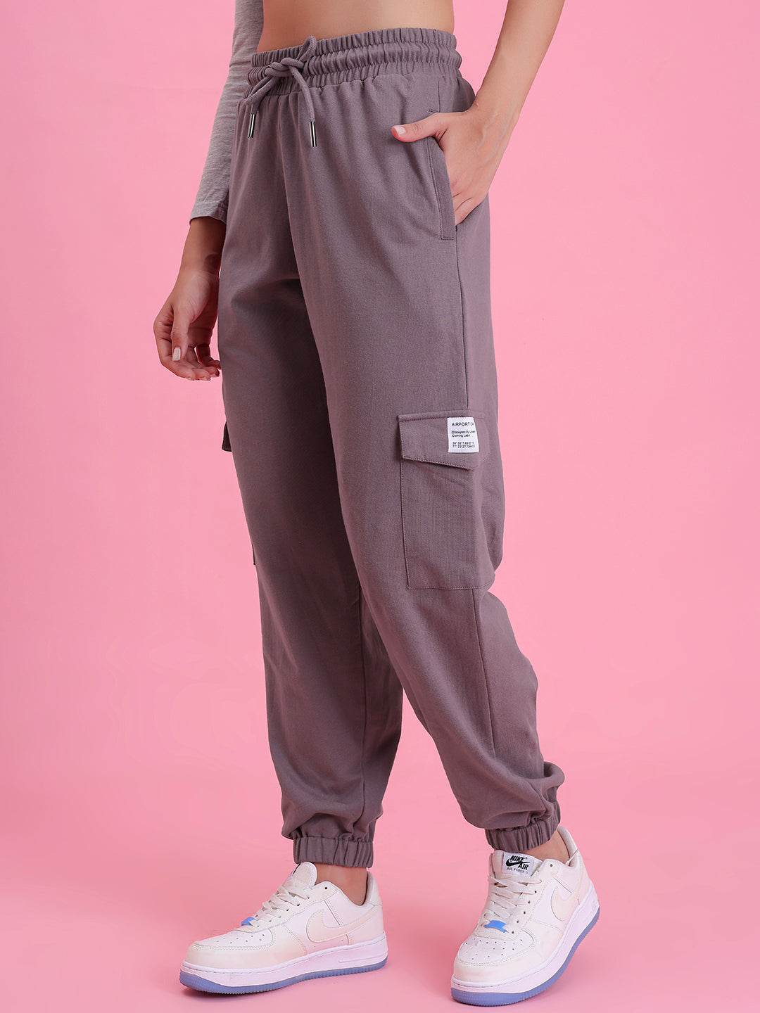 Side view of lavender cotton cargo pants showing cargo pocket