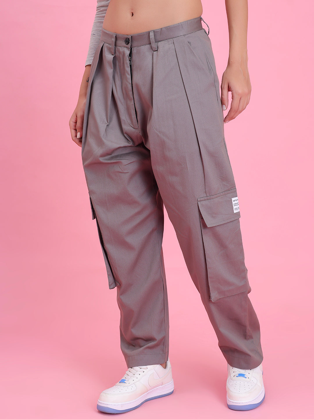 Detail of cargo pocket on grey cotton pants