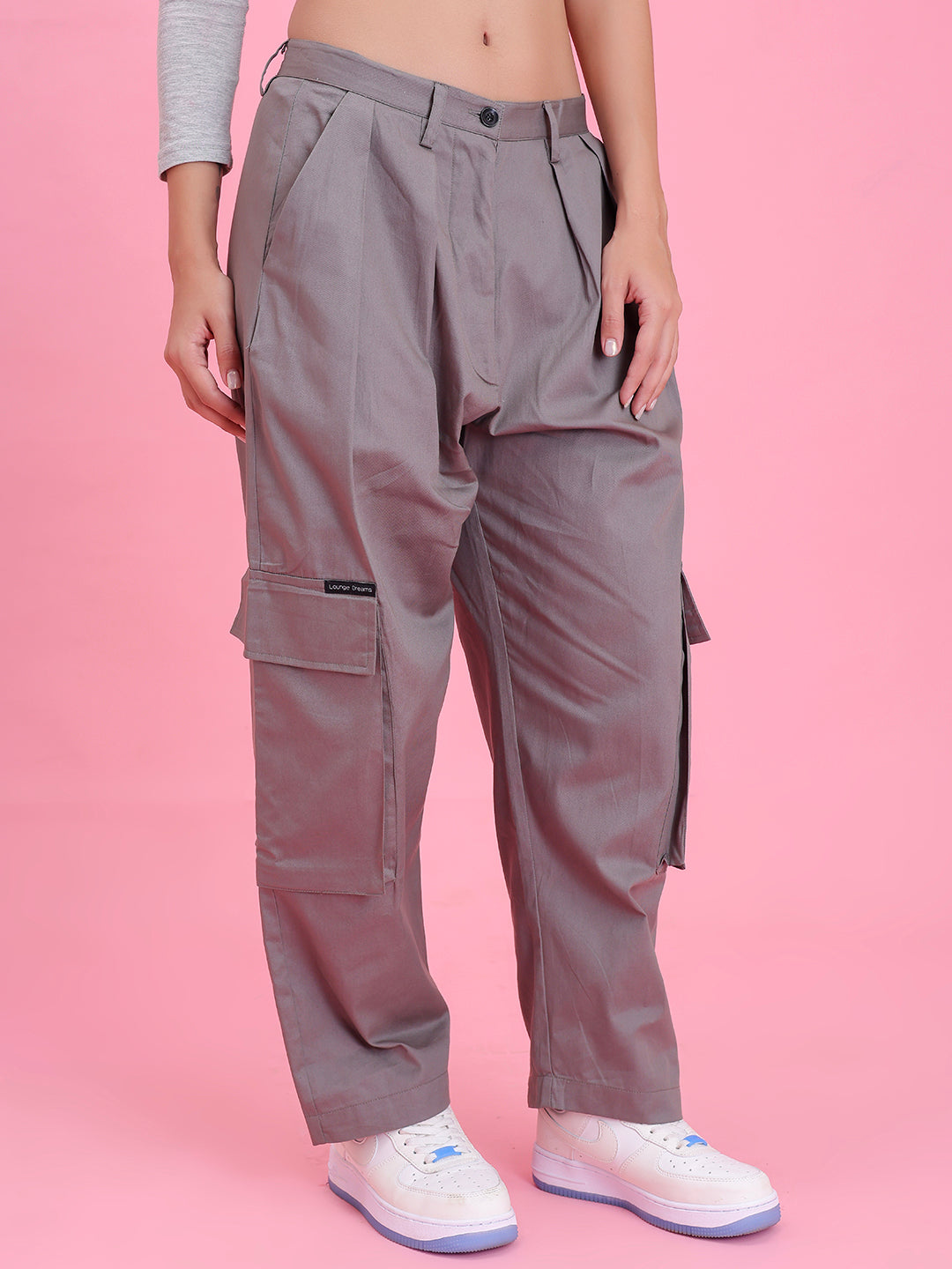 Close-up of elastic waistband on grey cargo pants