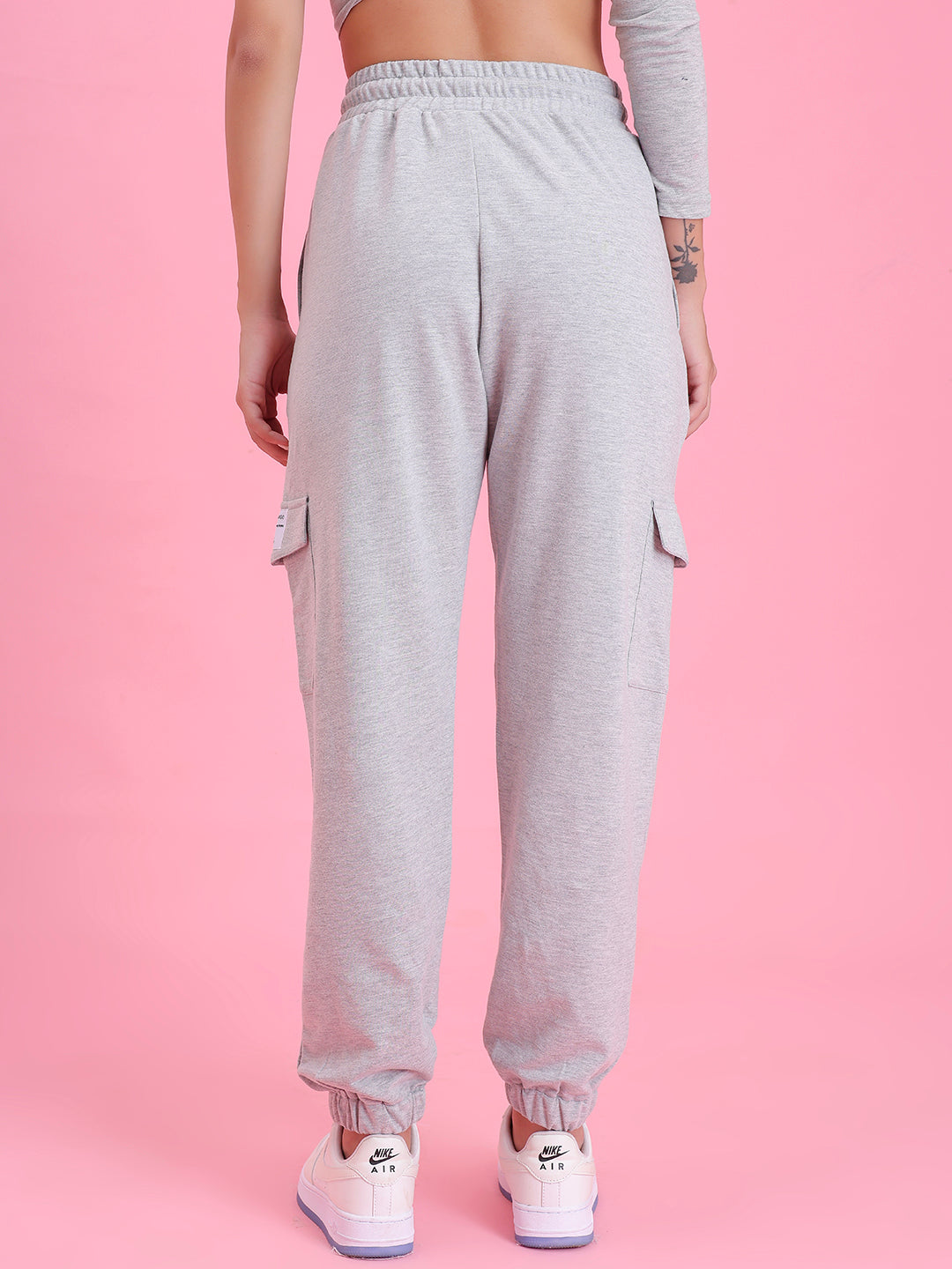 Close-up of elastic waistband on grey cargo pants