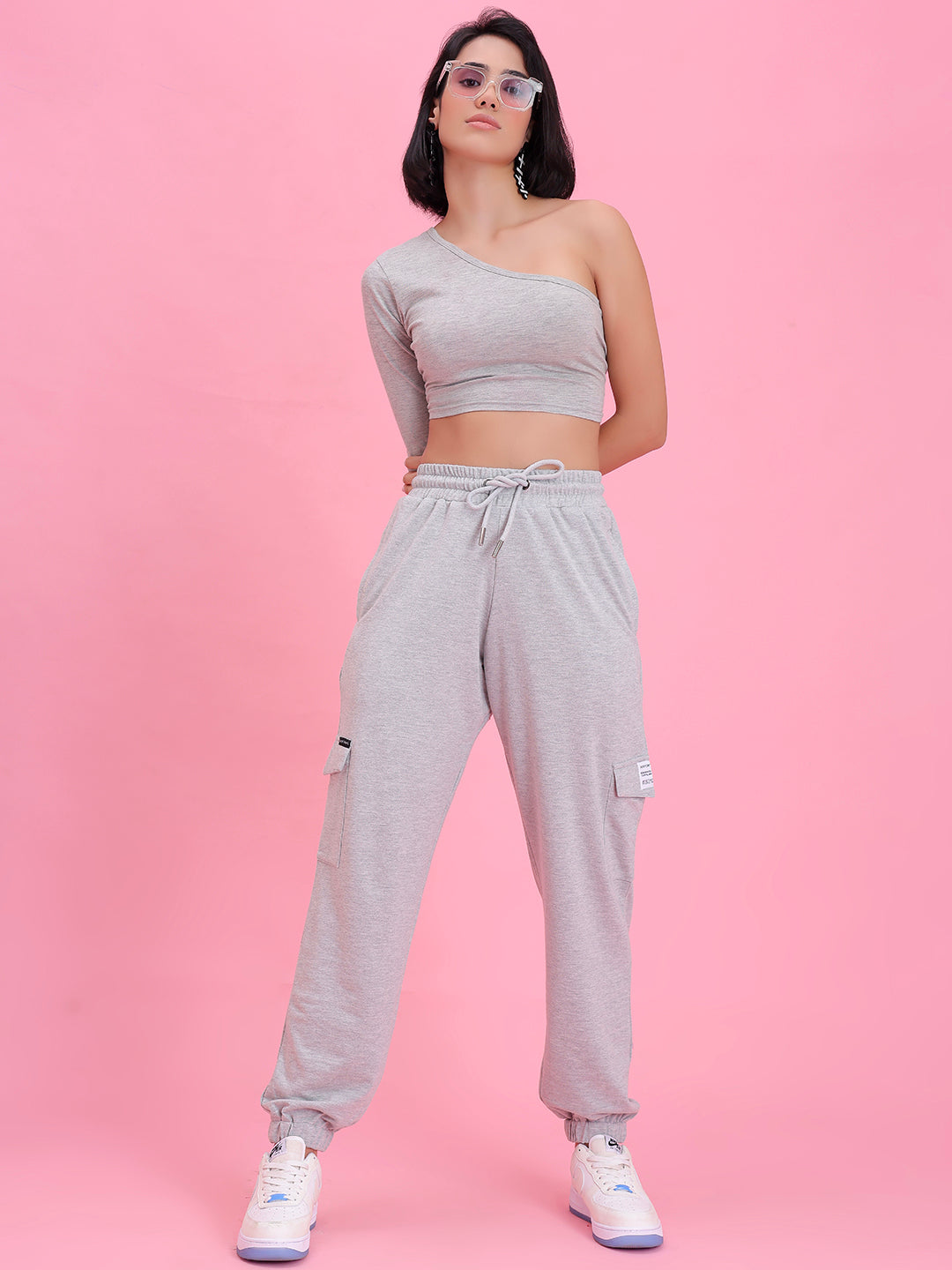 Model wearing grey cotton cargo pants in a casual look