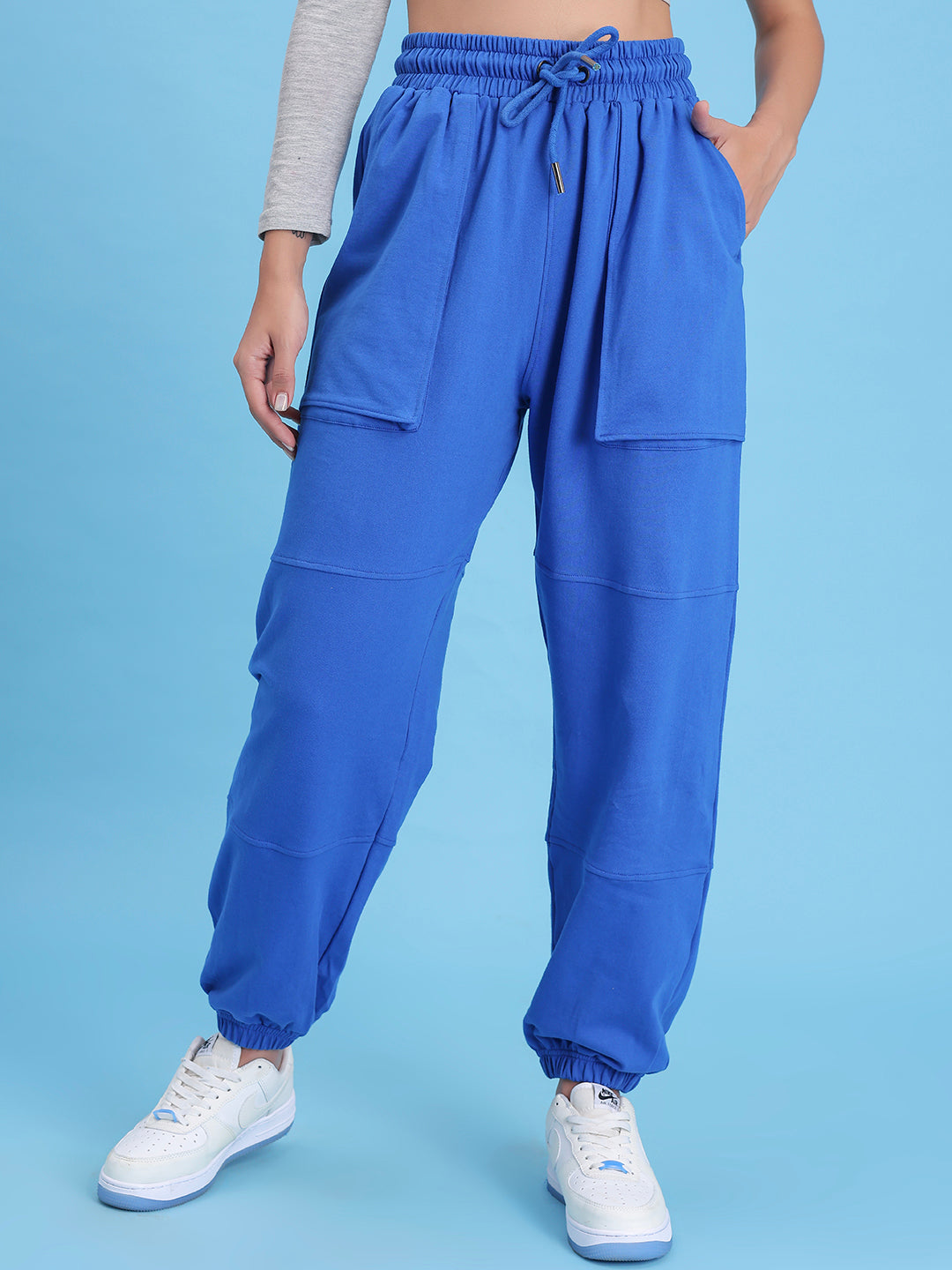 Front view of blue cotton knit joggers with tapered leg