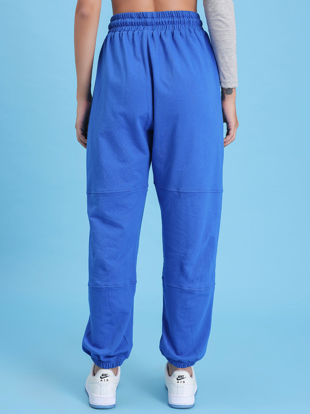 Back view of blue cotton knit joggers