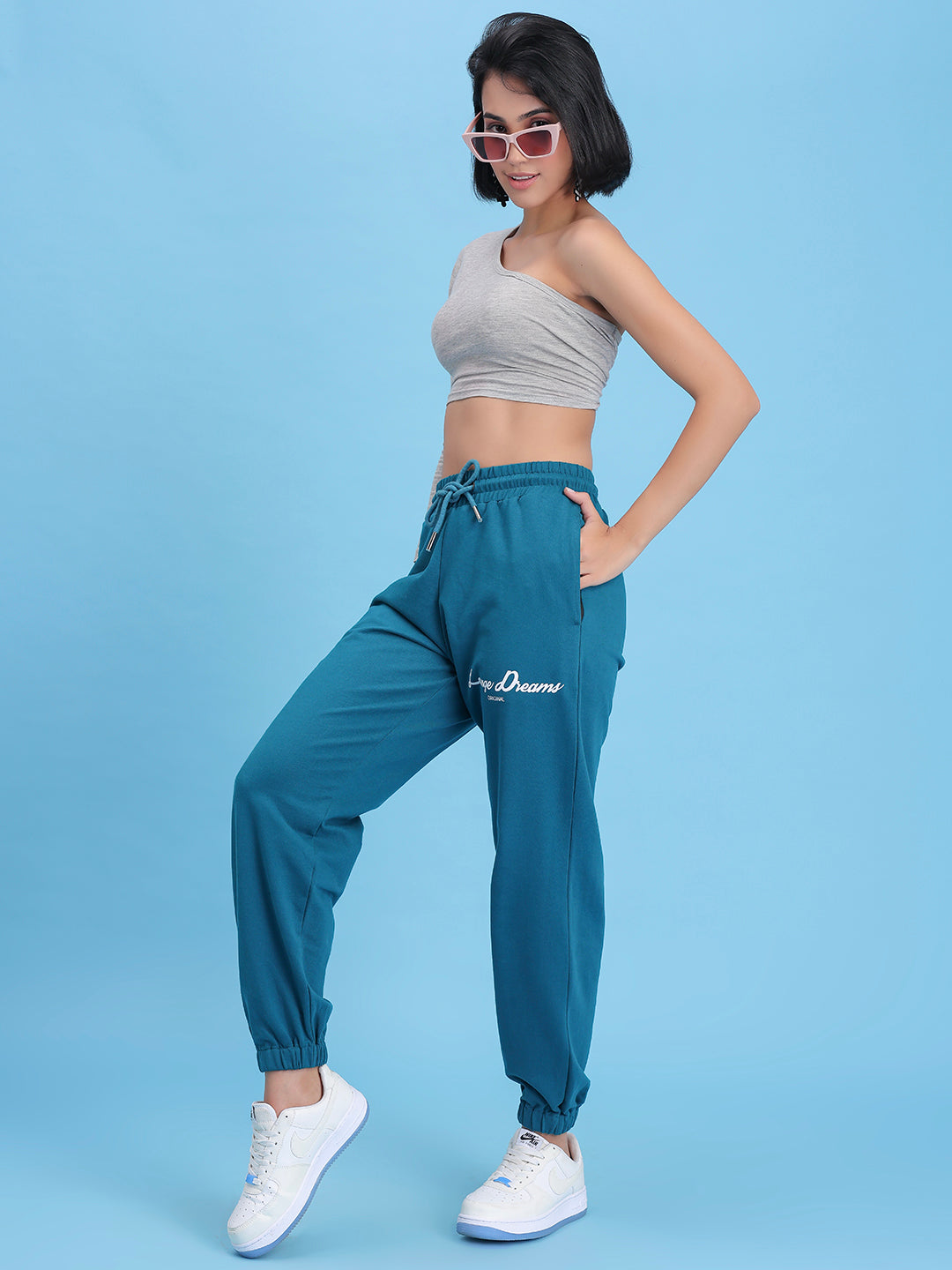 Back view of teal cotton knit joggers