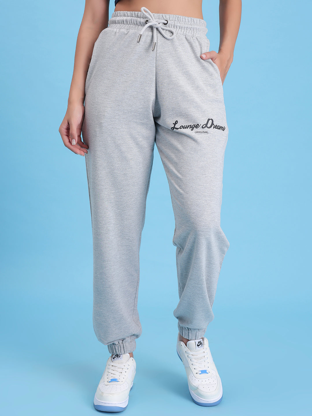 Front view of grey cotton knit joggers with tapered leg