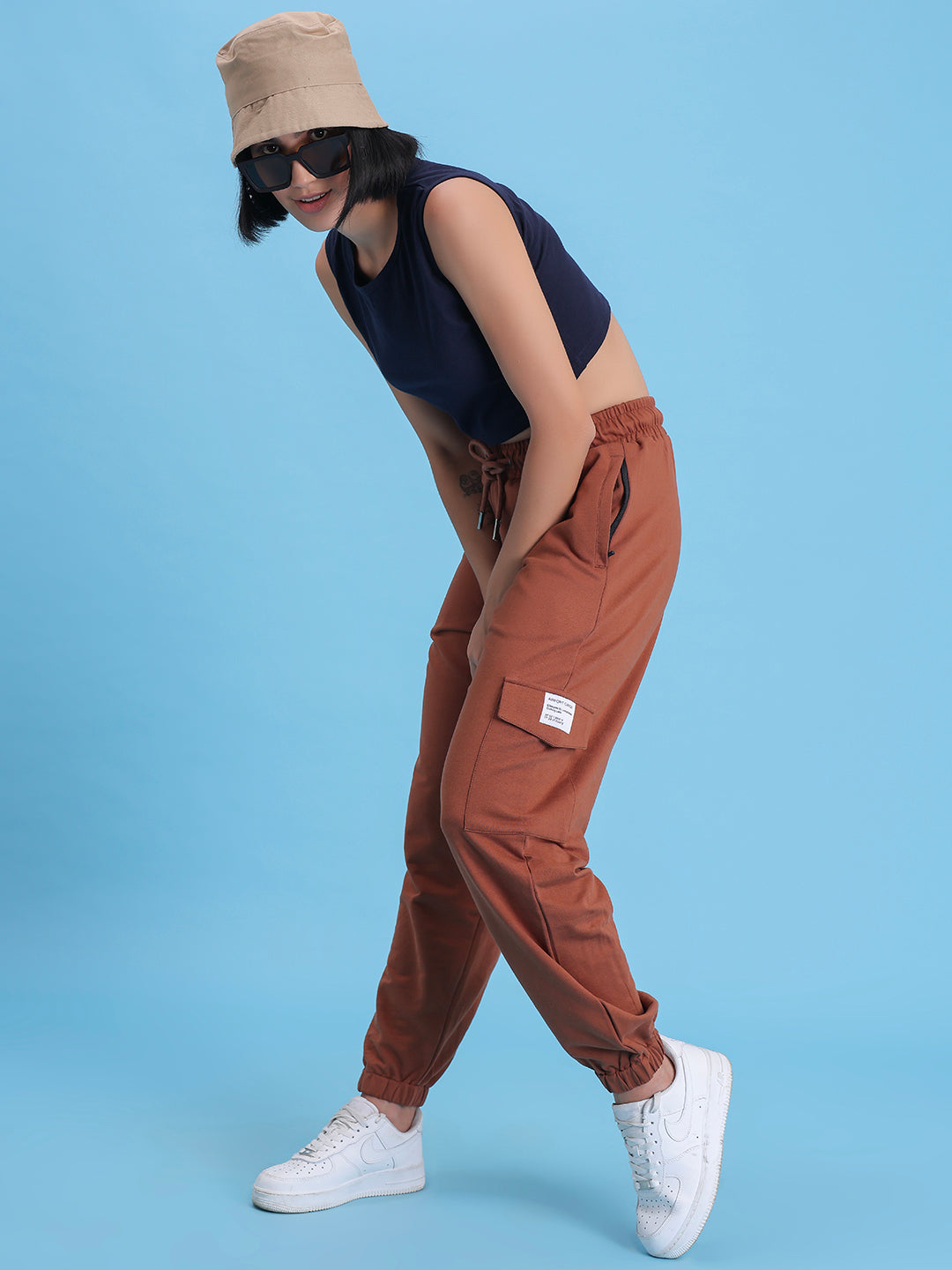 Close-up of elastic waistband on brown cargo pants