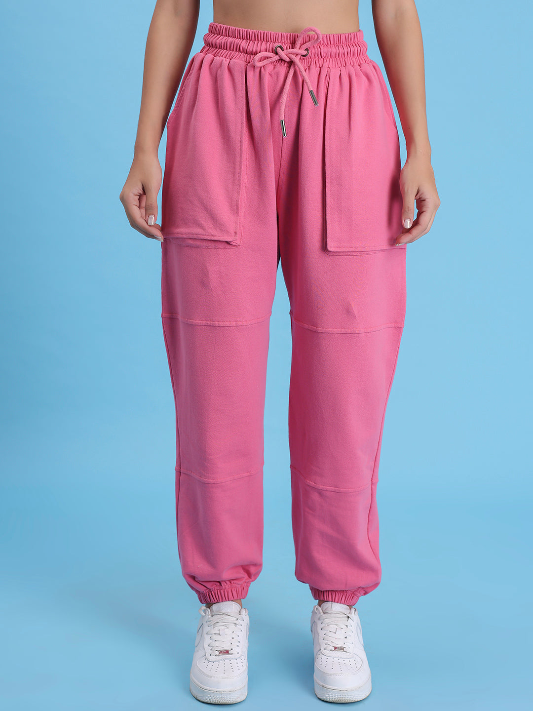 Front view of pink cotton knit joggers with tapered leg