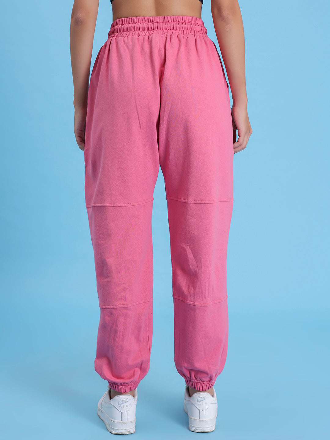 Pink cotton joggers styled with a hoodie