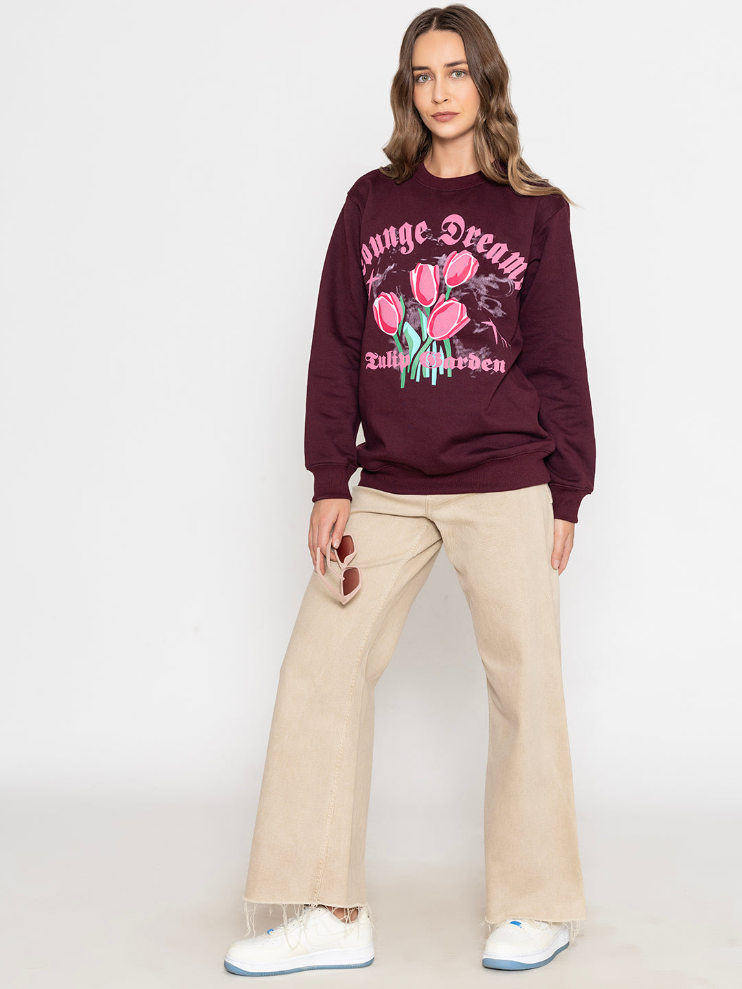 Detail of ribbed cuffs on wine sweatshirt