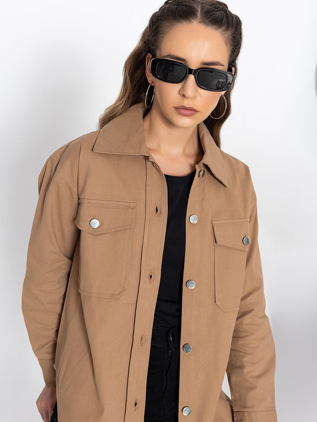 Detail of spread collar on beige cotton shacket