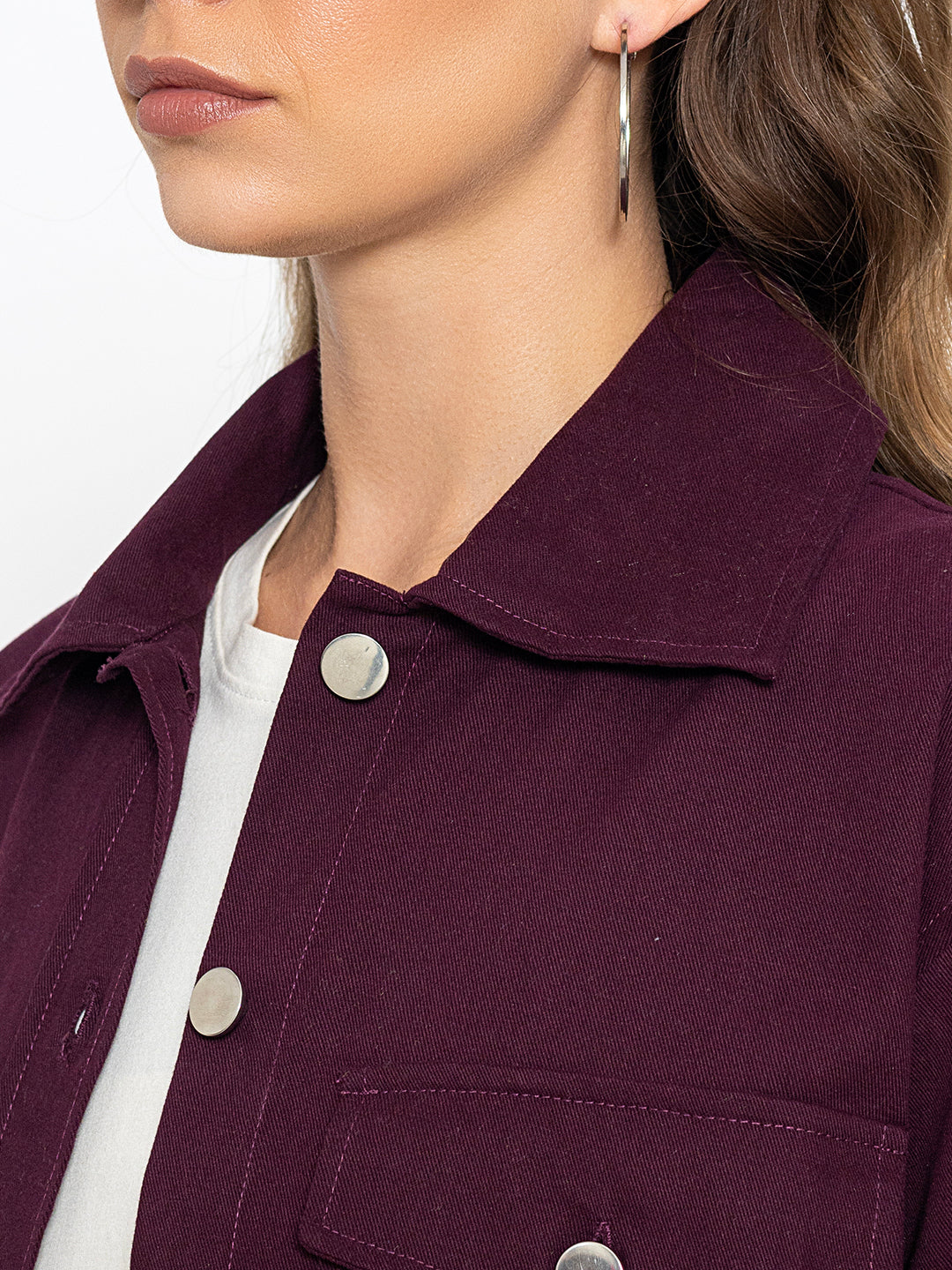 Lifestyle shot of wine shacket layered over a tee