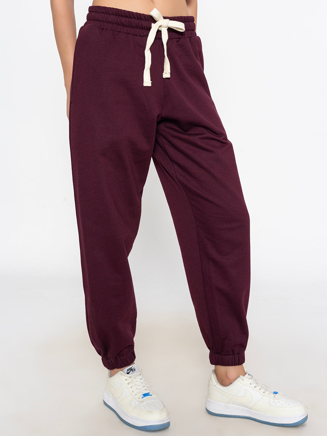 Front view of green cotton blend joggers for women