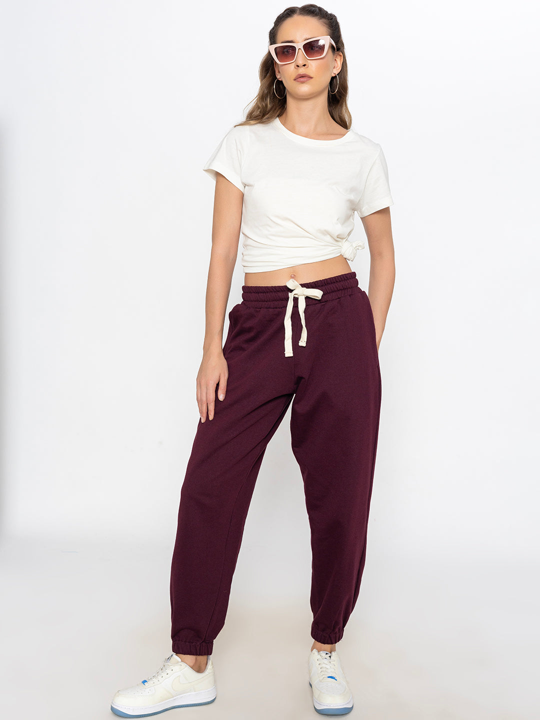 Close-up of elastic waistband on green joggers