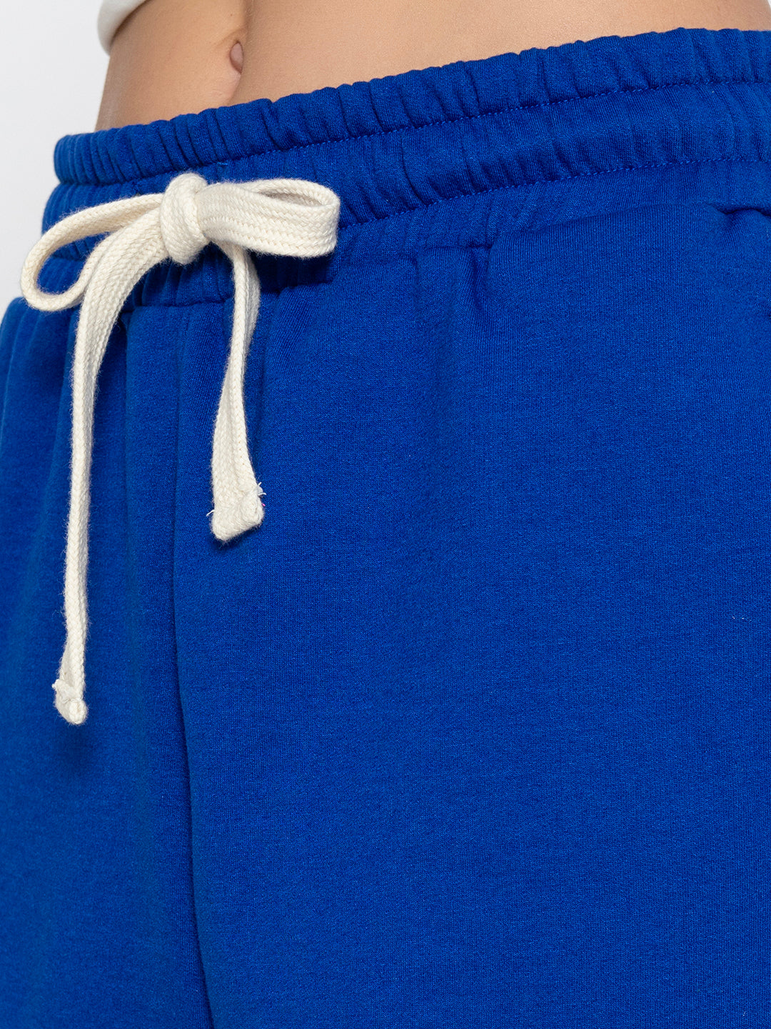 Full-length view of blue cotton blend joggers