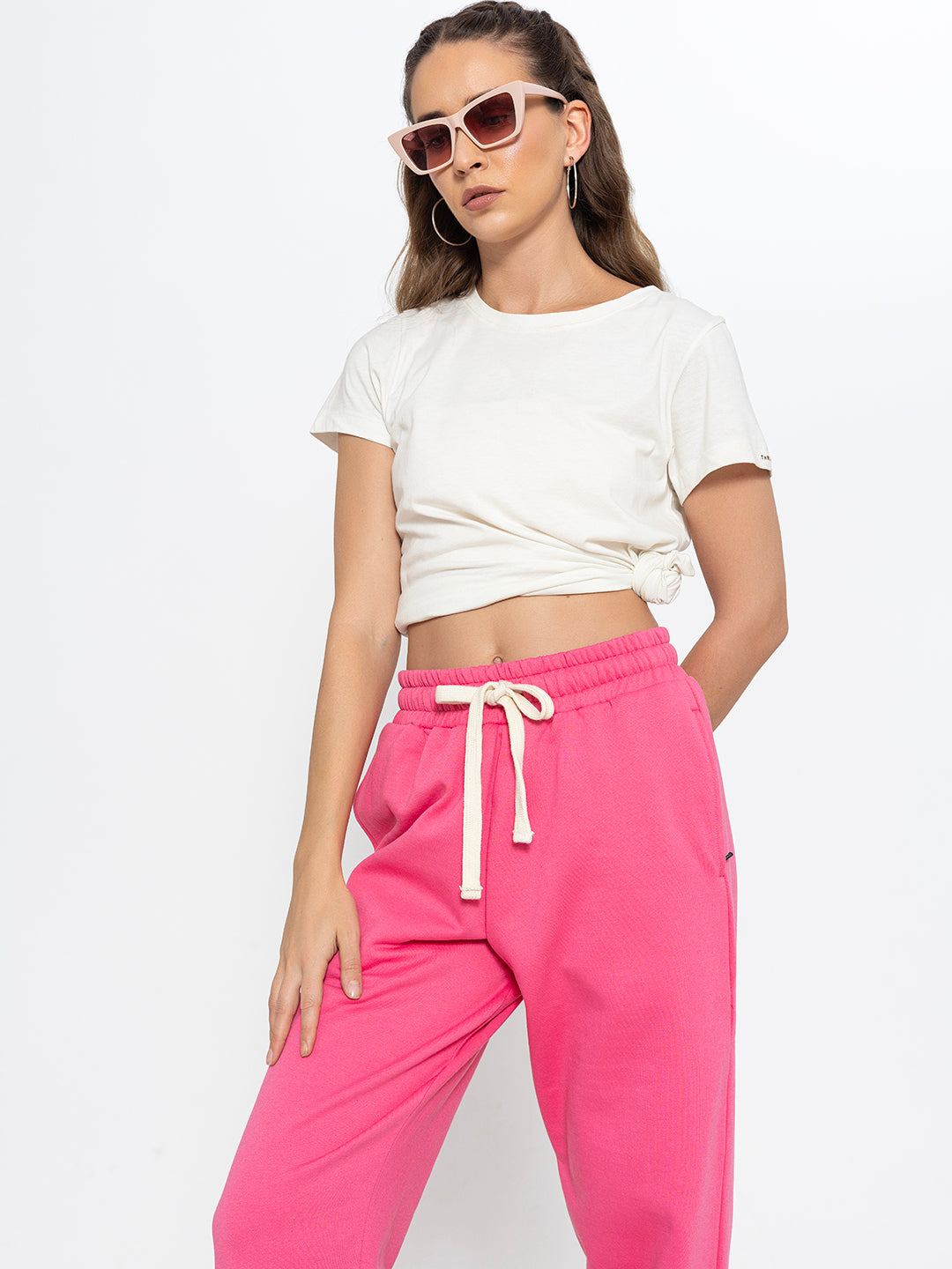 Close-up of elastic waistband on pink joggers