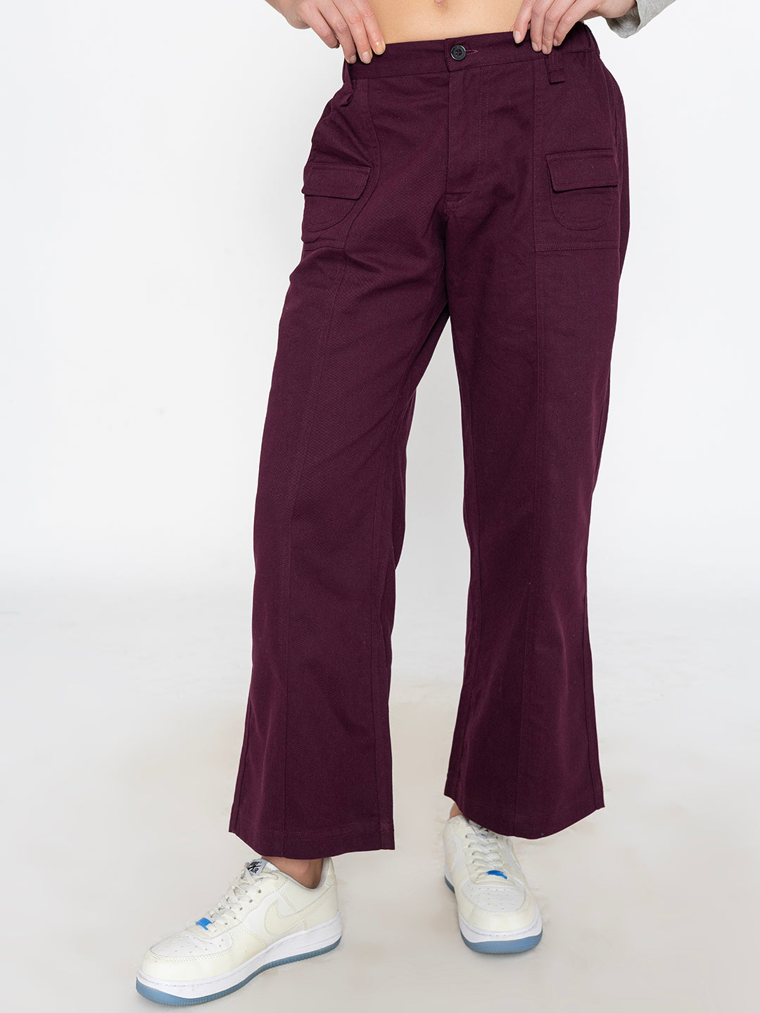 Close-up of elastic waistband on wine cotton trousers