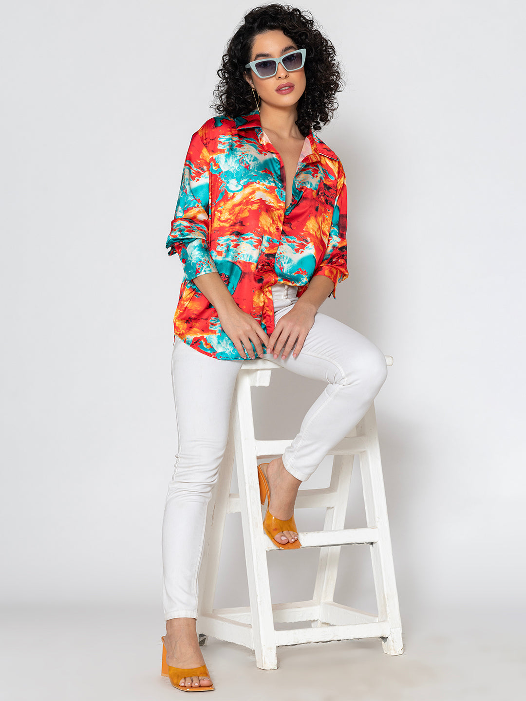 Spread collar and button placket detail on red satin shirt