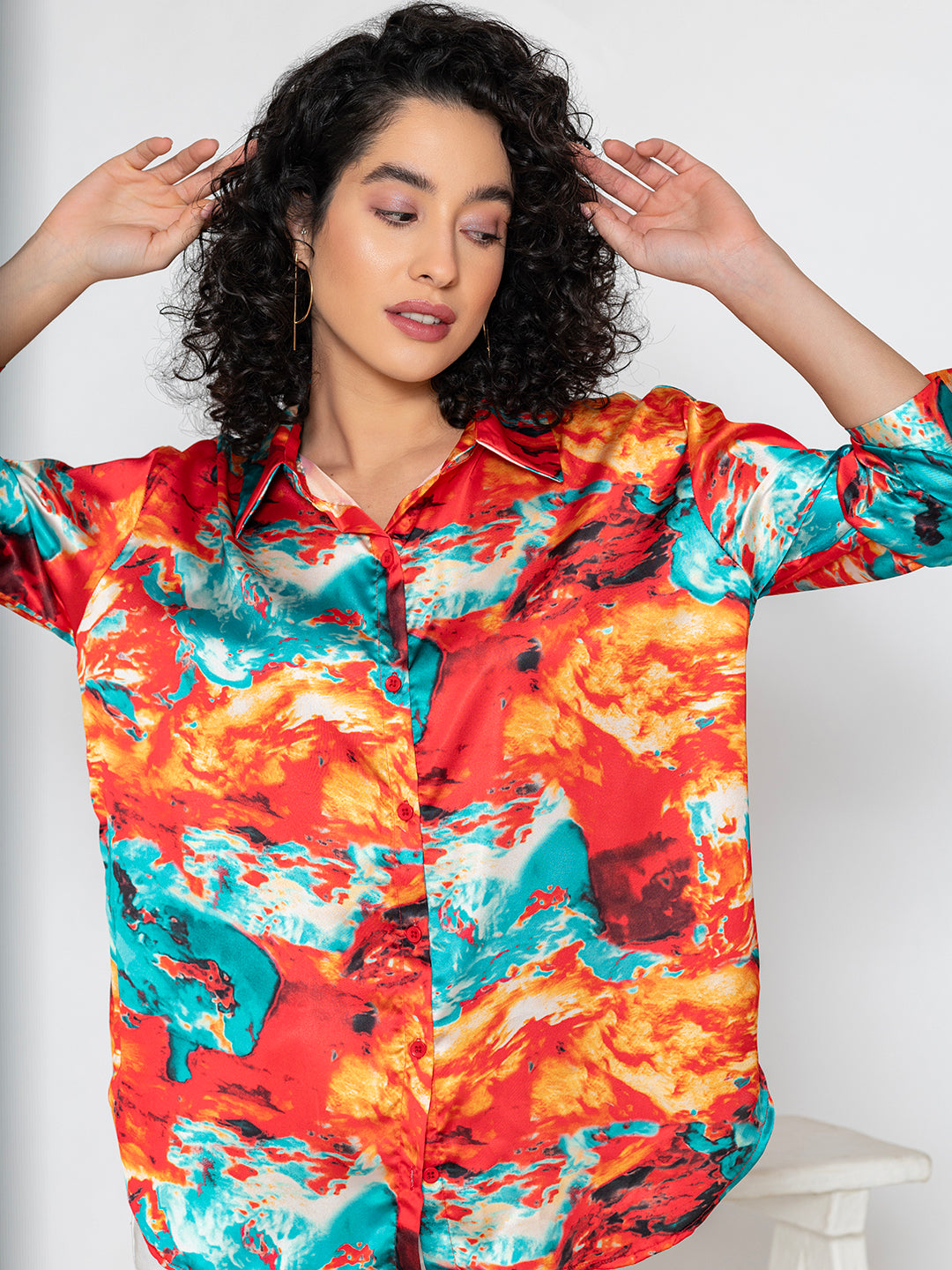 Back view of red floral print satin shirt