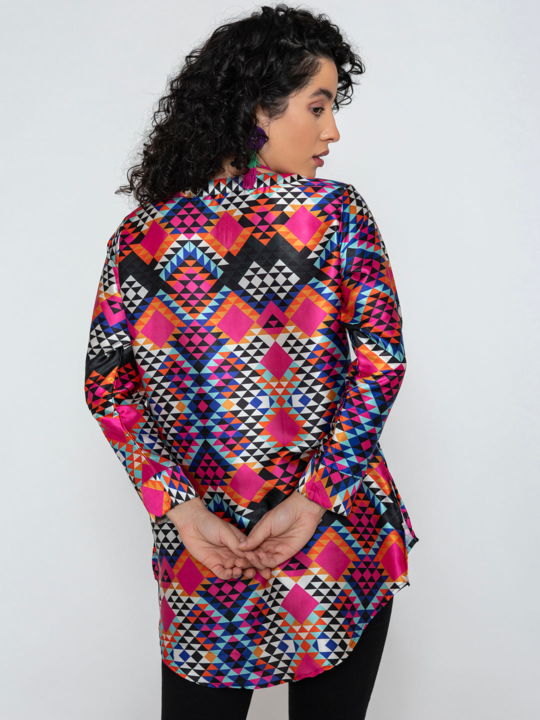 Close-up of multicolor floral pattern on satin kurta fabric