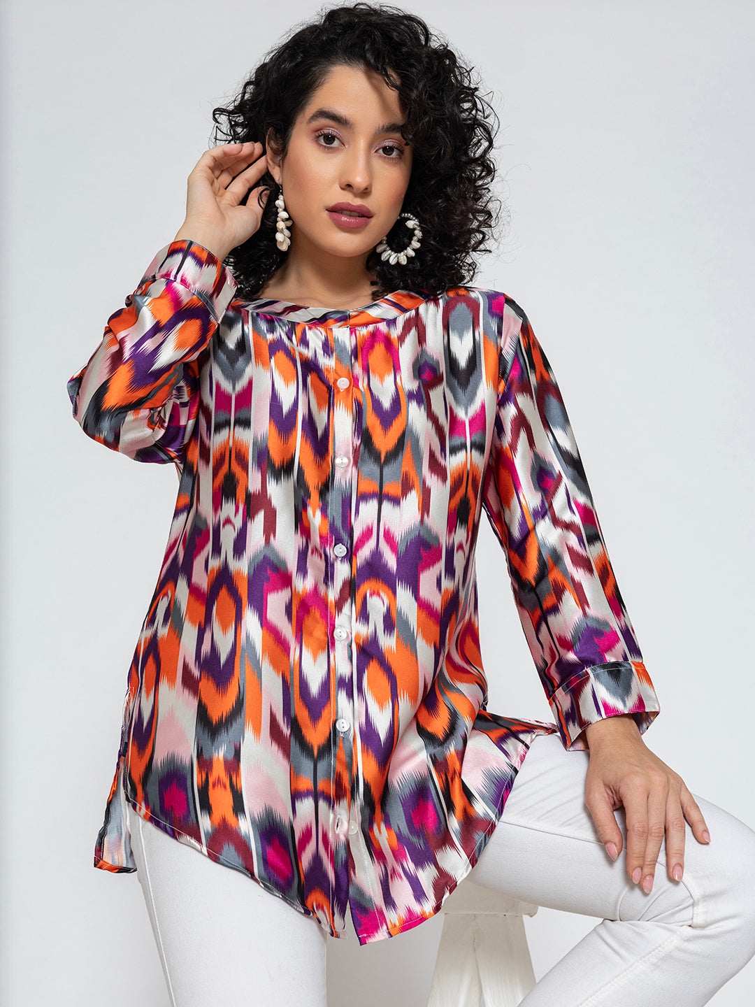 Hemline detail on multicolor Atik printed satin kurta