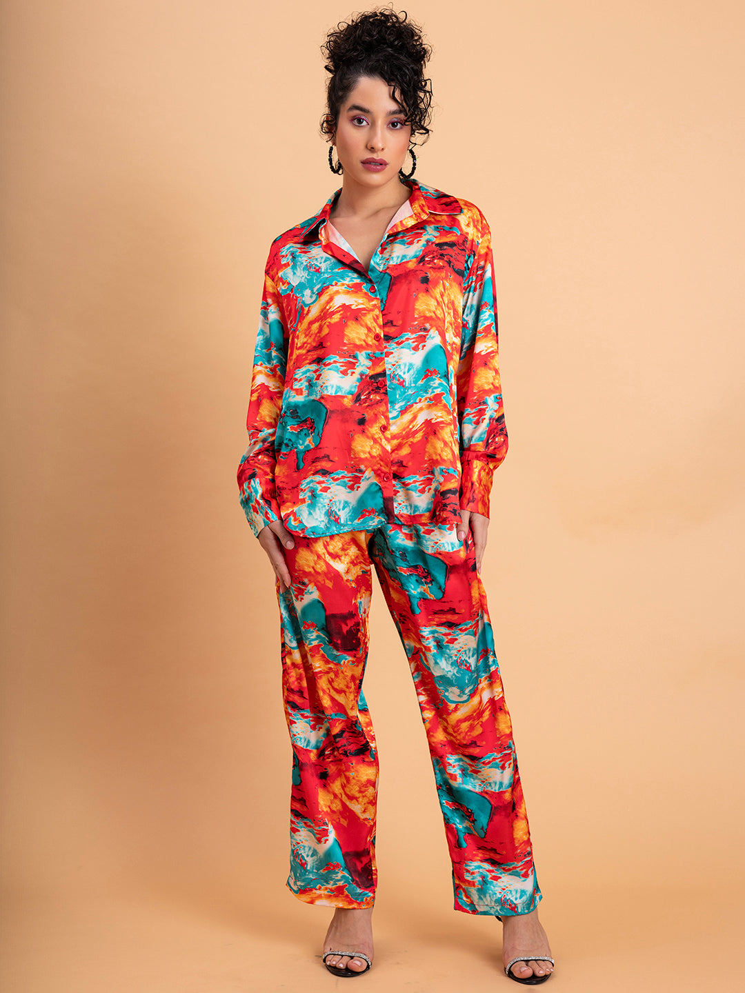 Close-up of floral print on red satin co-ord fabric