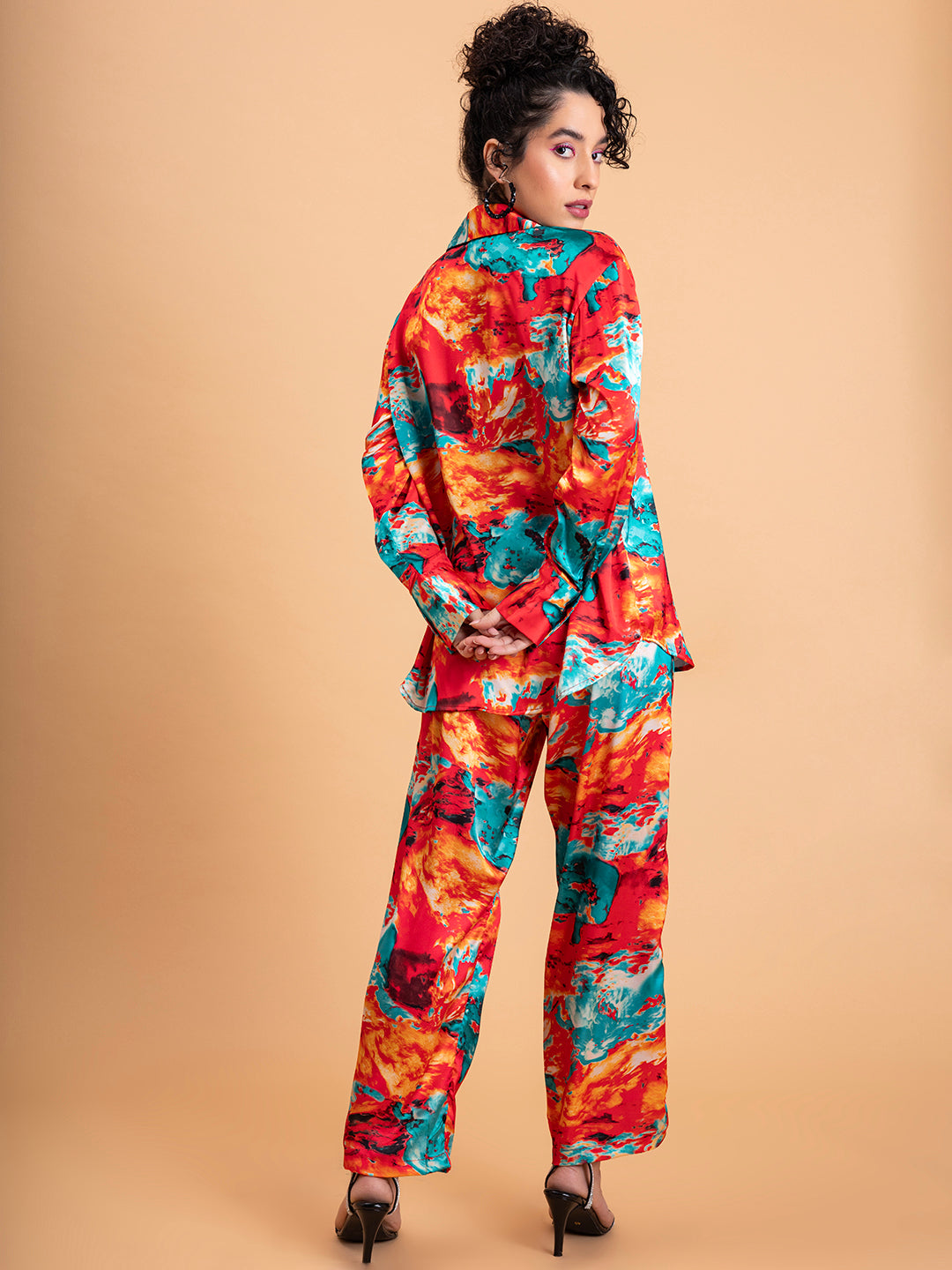 Trouser detail of red satin co-ord set