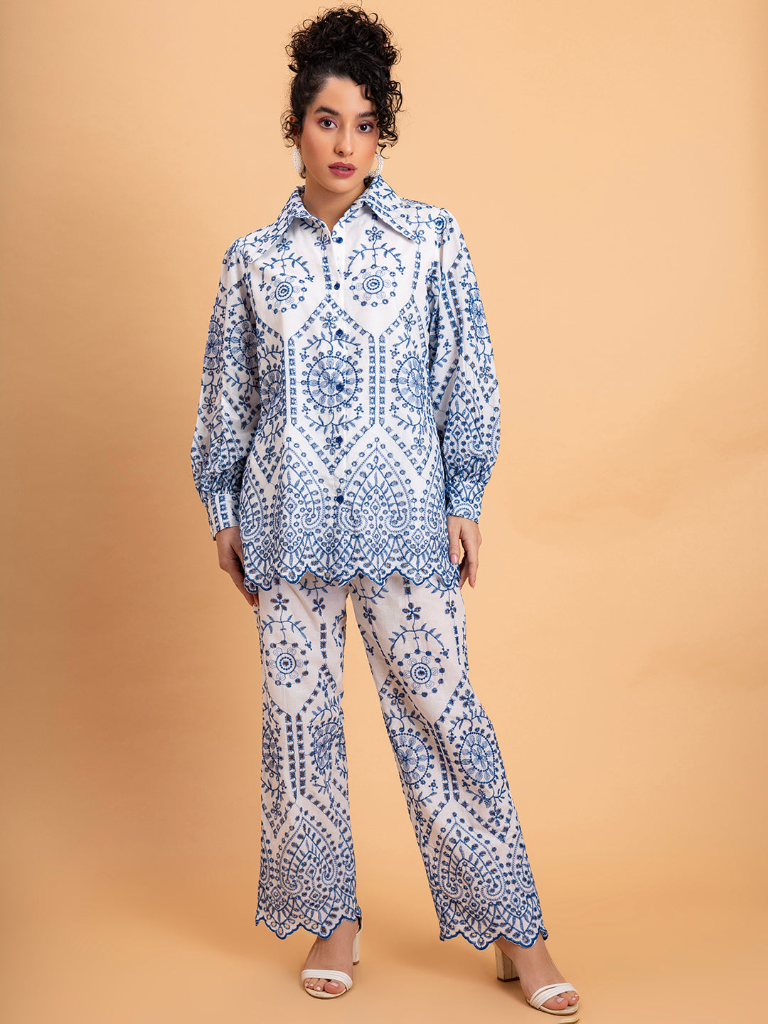 Front view of white pure cotton shorts co-ord set with blue schiffli embroidery