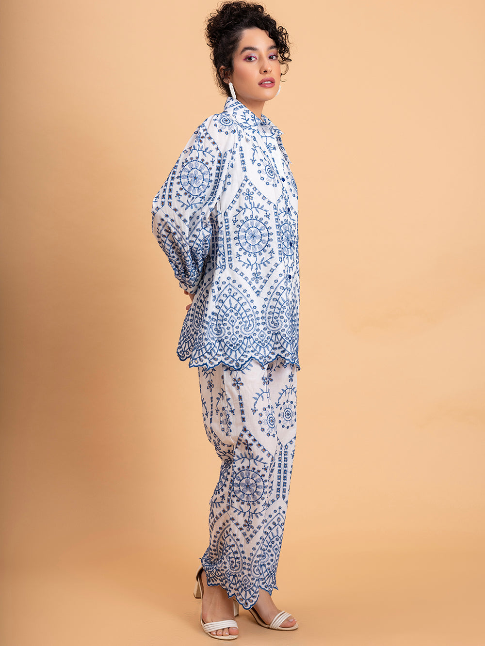 Side view of white embroidered cotton co-ord set top and shorts