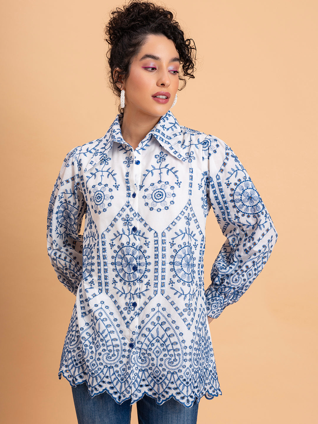 Front view of white pure cotton shirt with blue schiffli embroidery