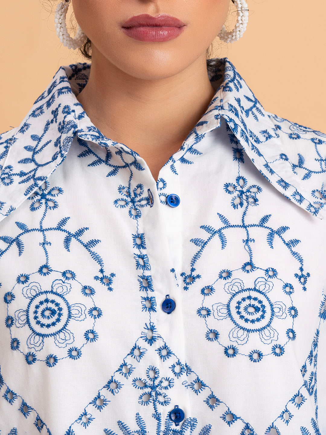 Back view of white embroidered cotton shirt with regular fit