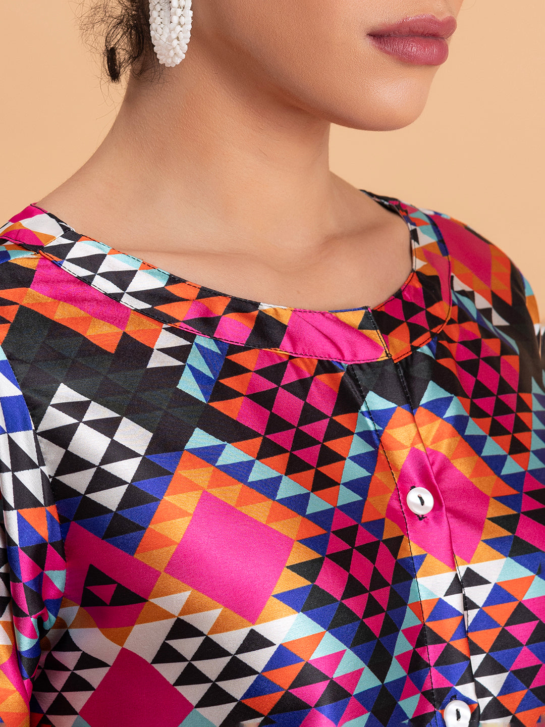 Close-up of spread collar on multicolor satin kurta