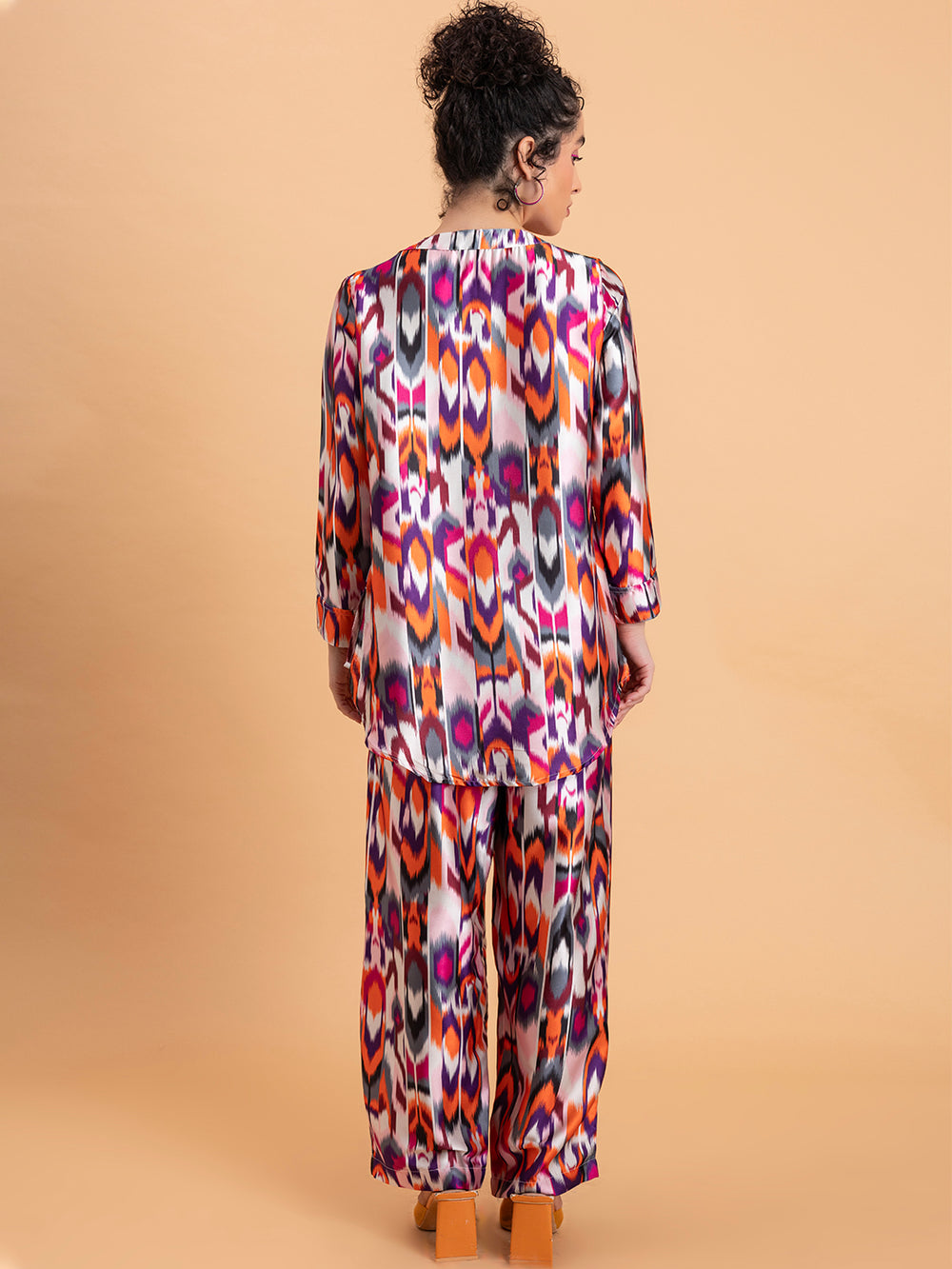 Side view of Atik print satin kurta and pant set