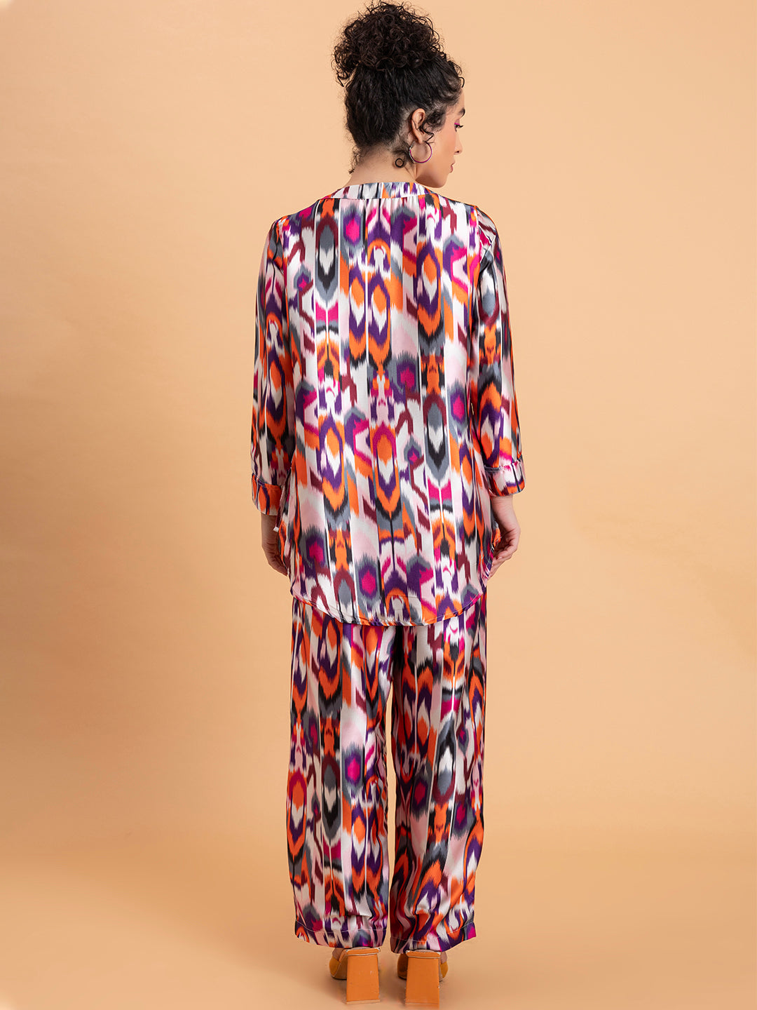 Side view of Atik print satin kurta and pant set