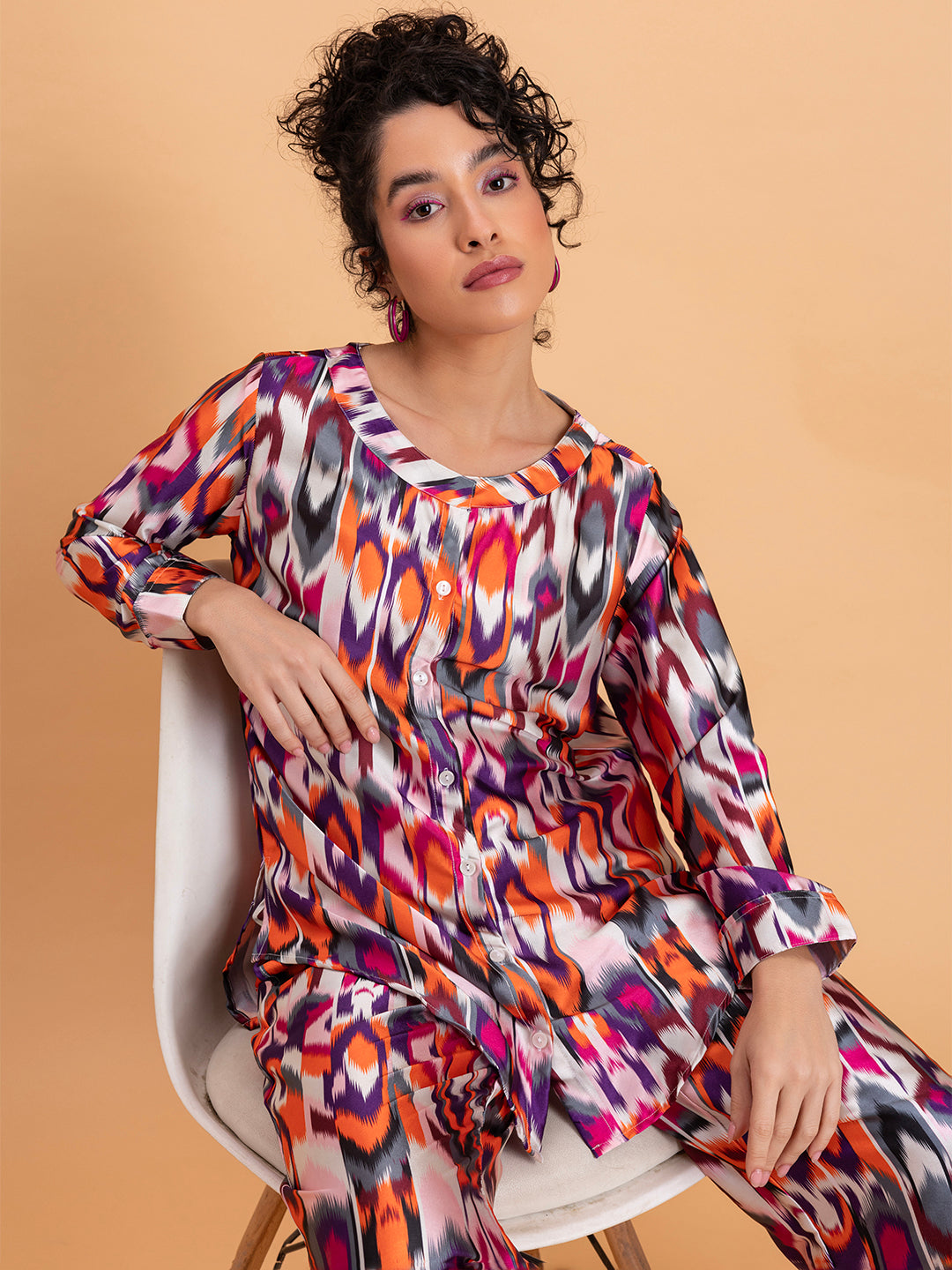 Lifestyle shot of model in Atik print satin co-ord set