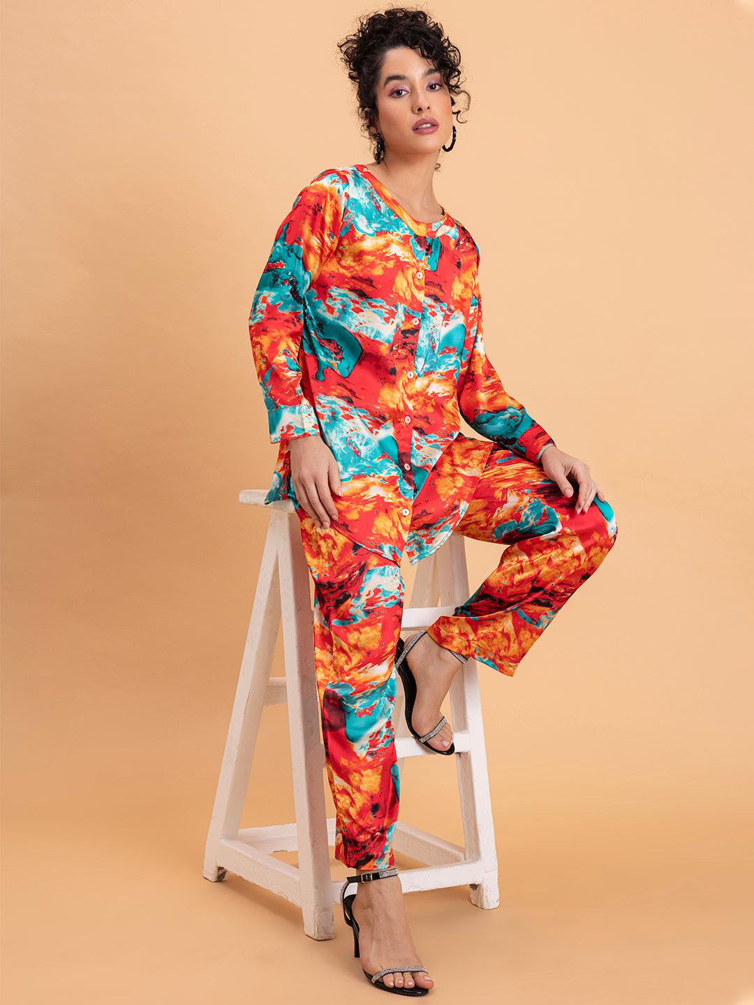 Coordinated red satin pant detail in floral print