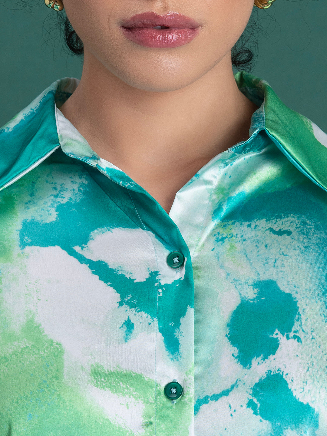 Trouser detail of green satin co-ord set