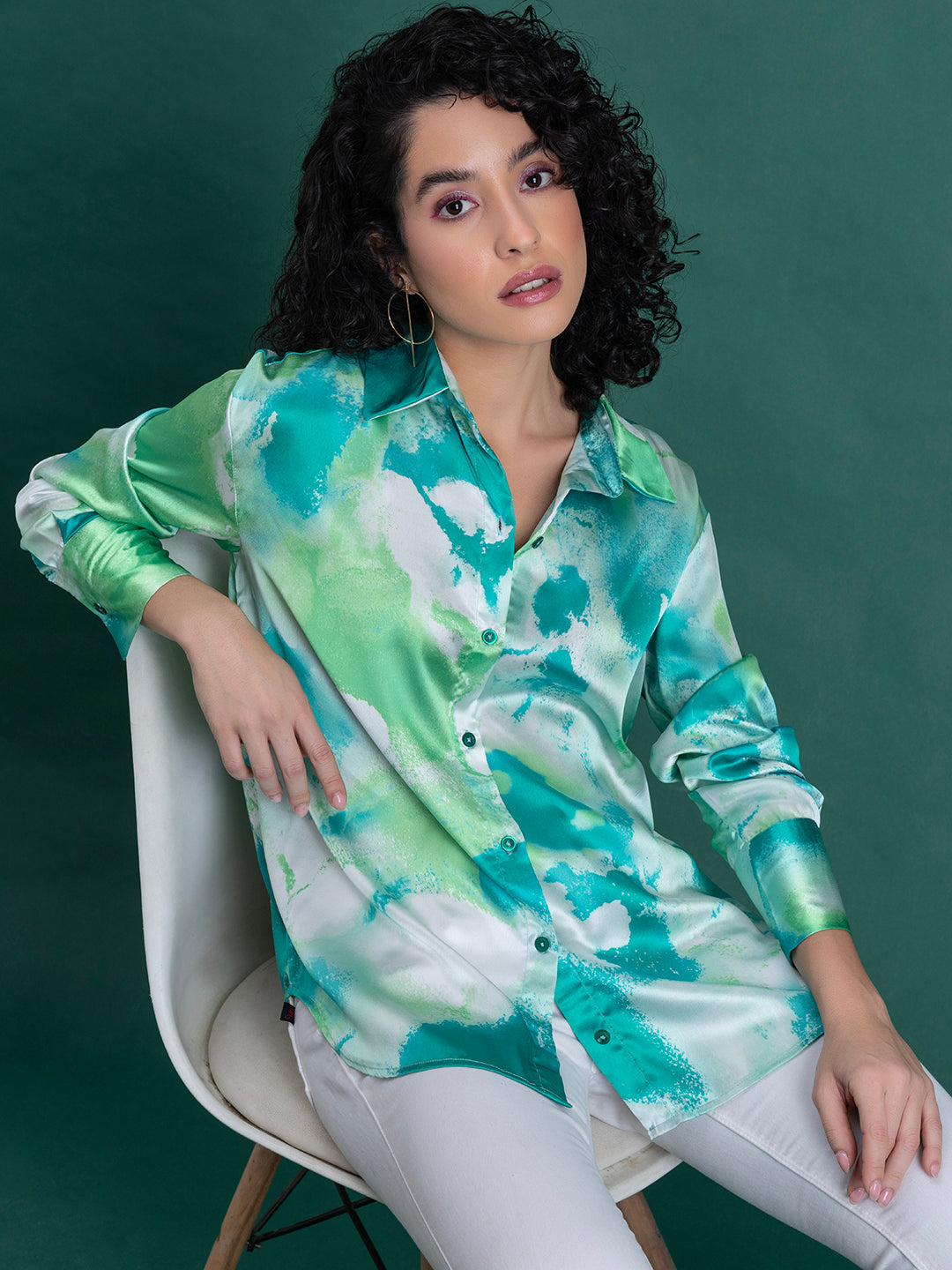Sleeve detail on green printed satin shirt