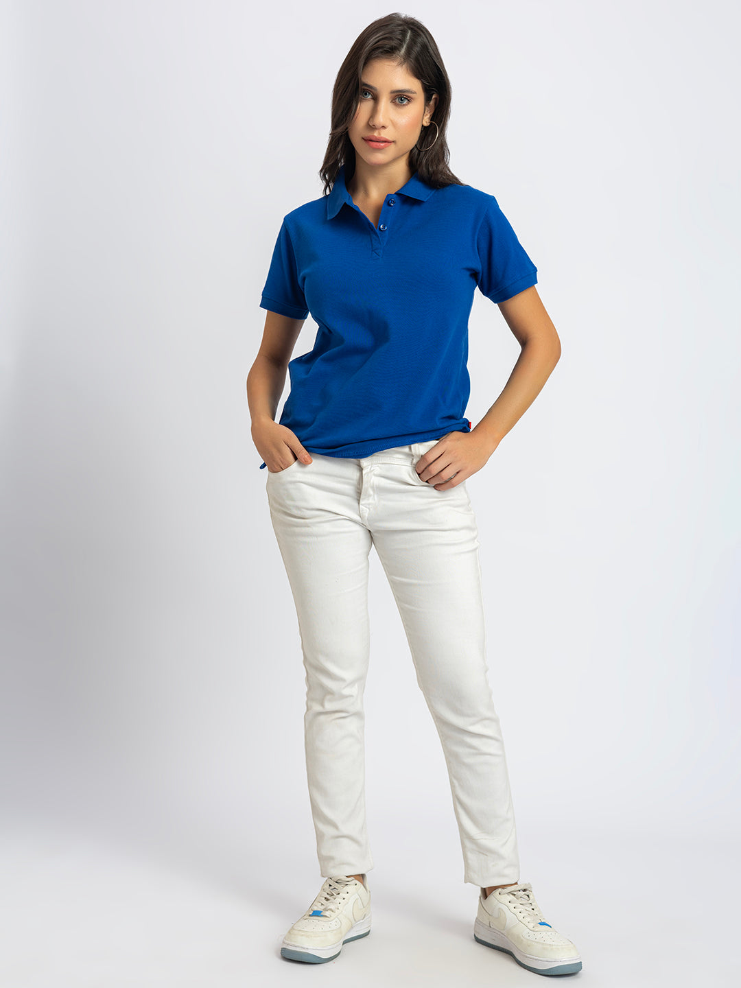 Close-up of polo collar on royal blue cotton T-shirt