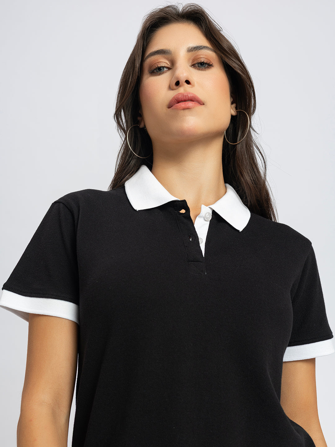 Black and white collar polo full outfit shot