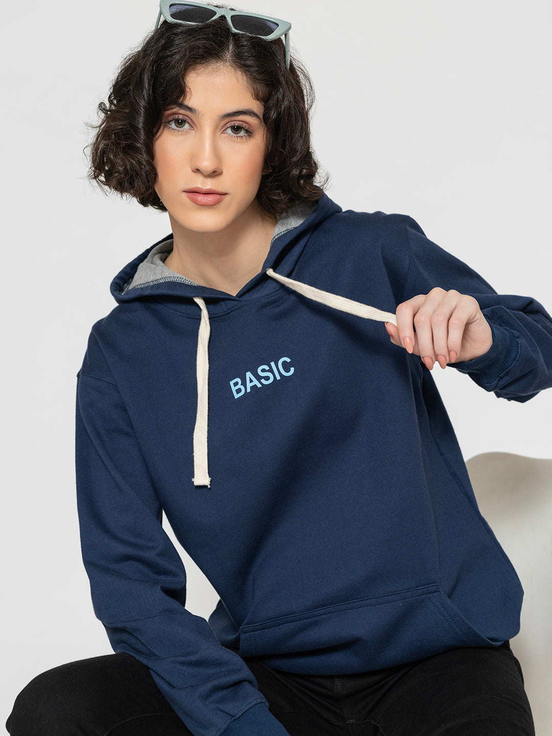 Front view of navy blue cotton fleece hoodie for women